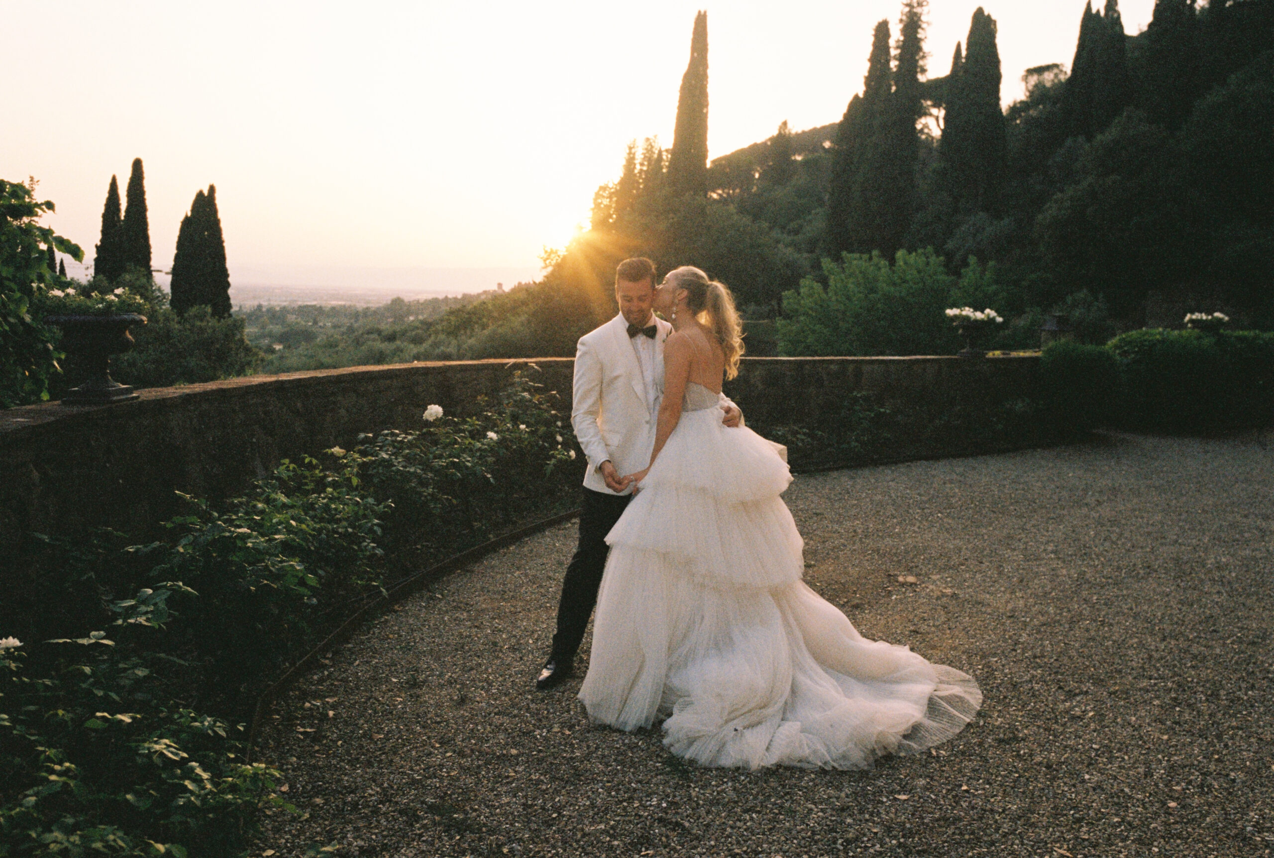 wedding photo in tuscany italy at sunset